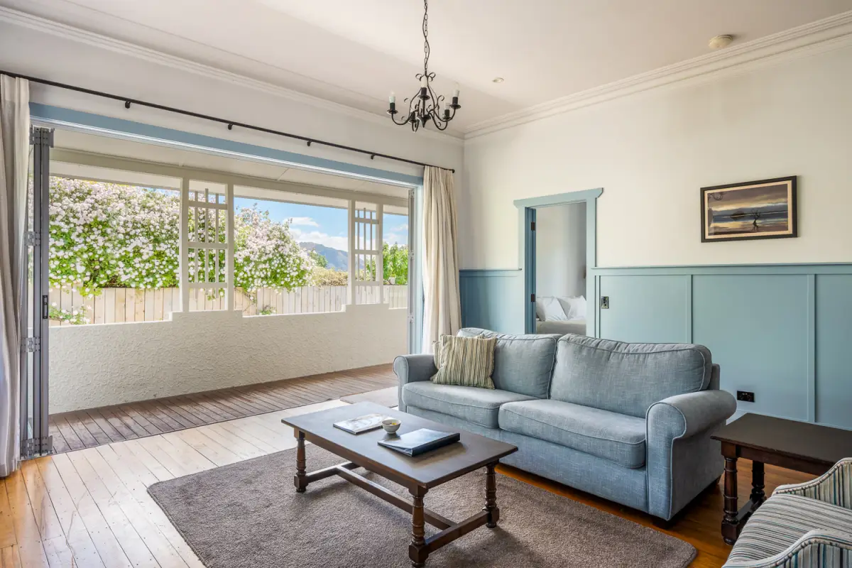 Lounge Area with Range Sliders & Outdoor Access 