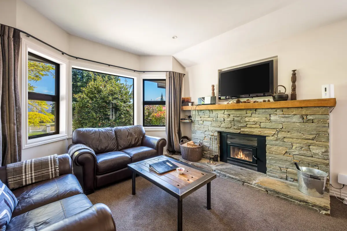 Cozy Living Room with Wood Fireplace 