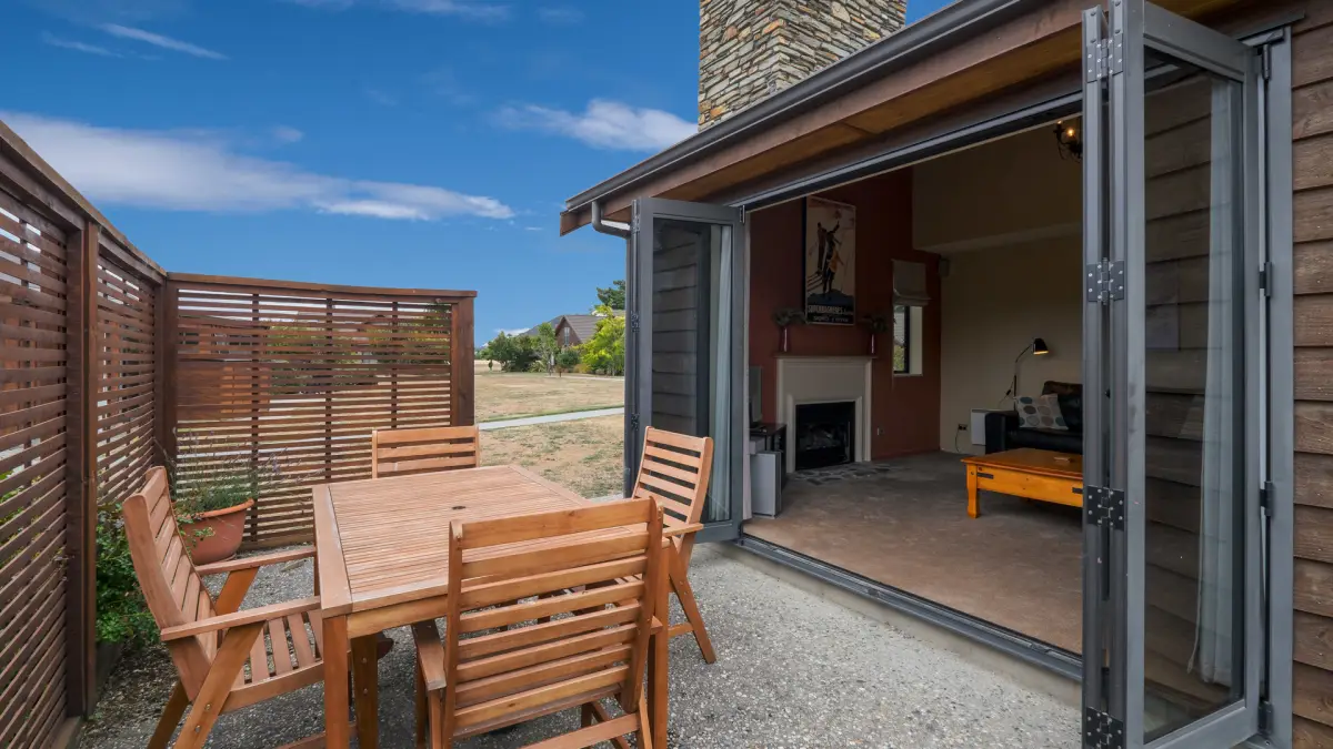 Large Open Doors to Back Patio 
