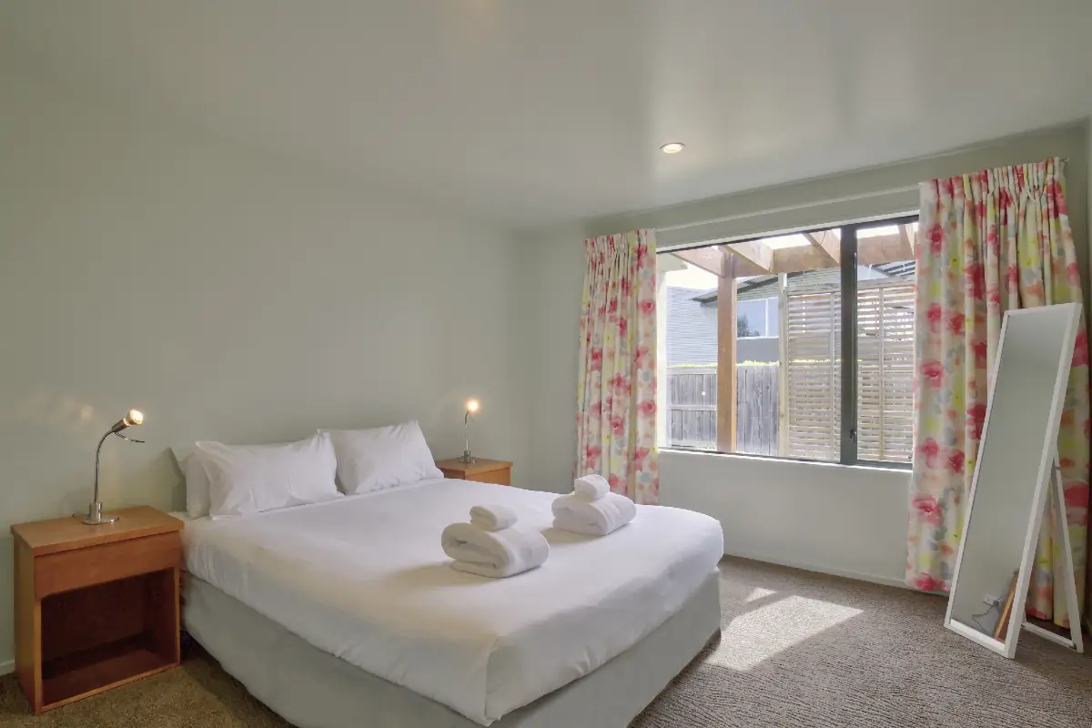 Second Bedroom with Large Windows 