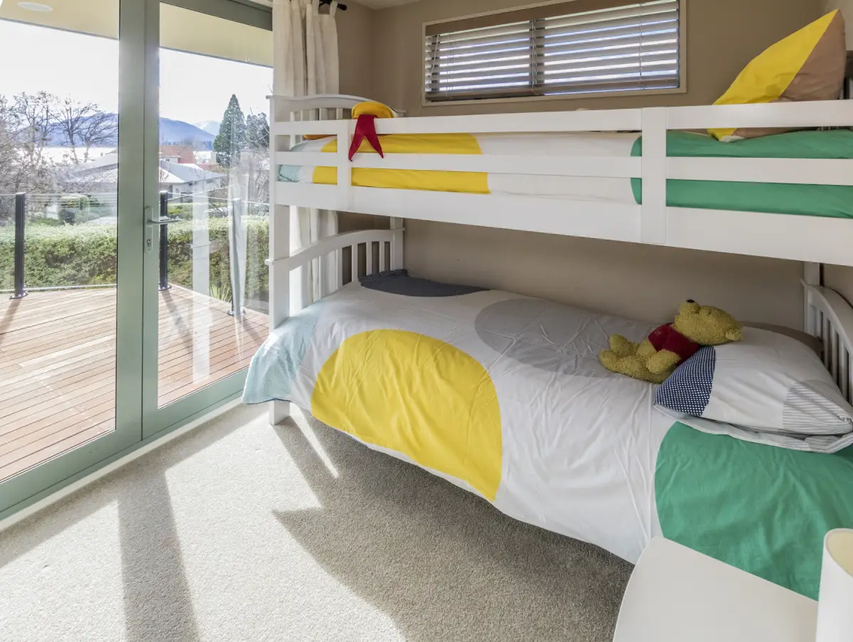 Bright Bunk Room with Balcony 