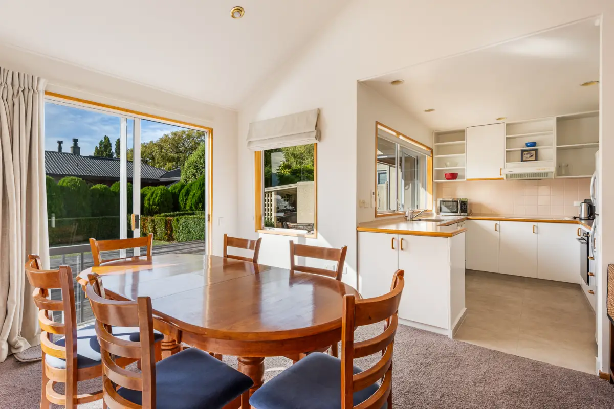 Dining and kitchen with lake views