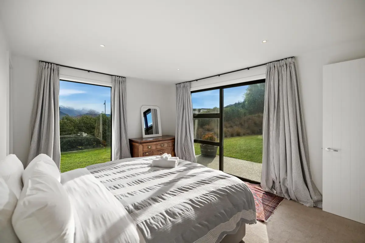 Master Bedroom with Outdoor Access & Mountain Views 