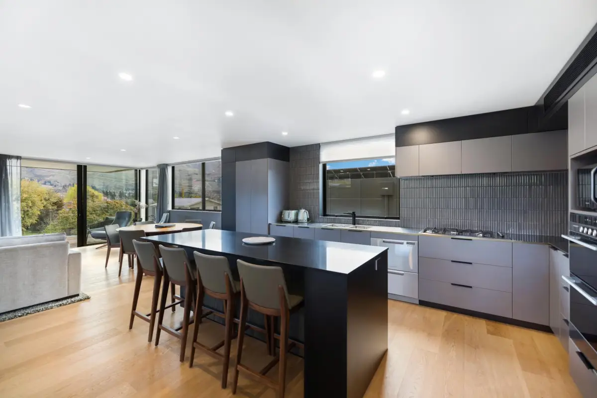 Modern Kitchen Flowing to Dining & Living