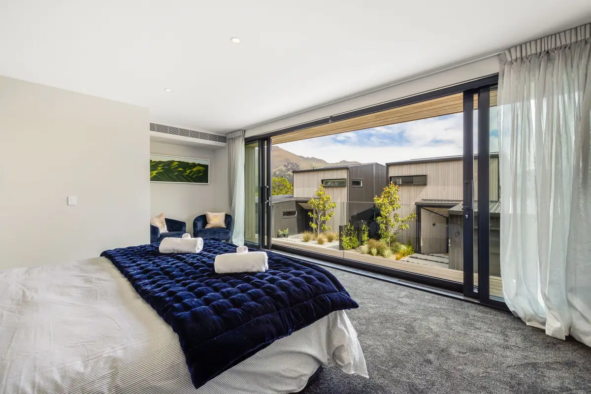 Master Bedroom with Sliding Balcony Doors