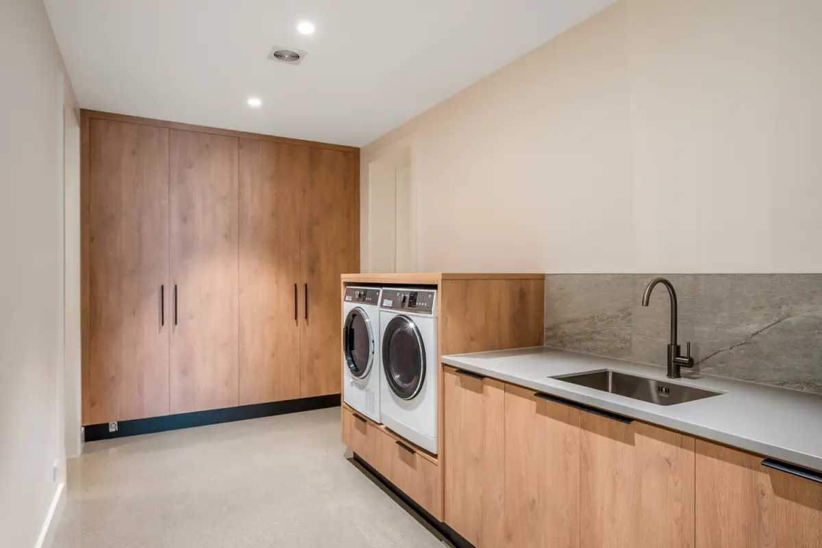 Spacious Laundry & Storage Area 