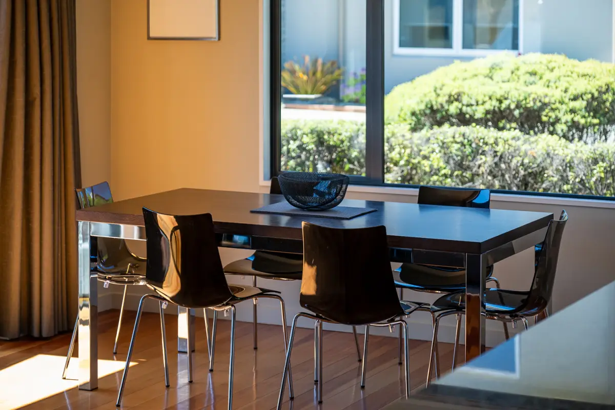 dining table with afternoon sun and mountain views