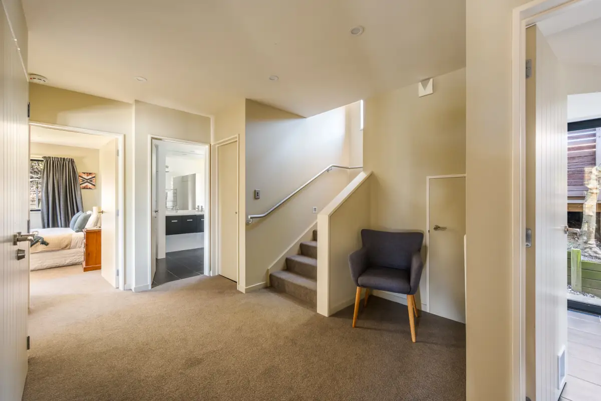 The lower level with 2 further bedrooms, laundry and family bathroom 