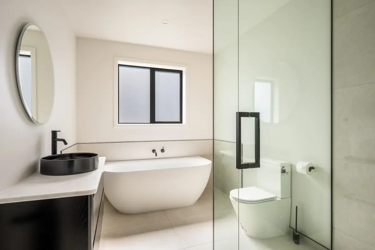 Family bathroom with bathtub and luxurious shower